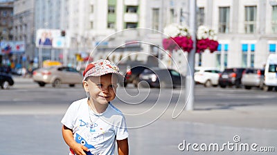 Running smiling boy Stock Photo