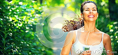 Running sporty girl. Beauty young woman jogging in the park Stock Photo