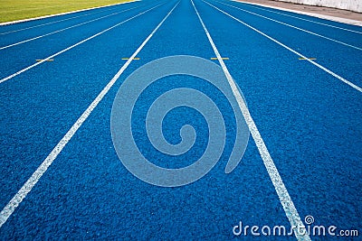 Running track with number. Blue running track in stadium. Stock Photo