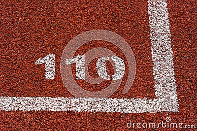 Running track rubber standard red color and white line and number 110 Stock Photo