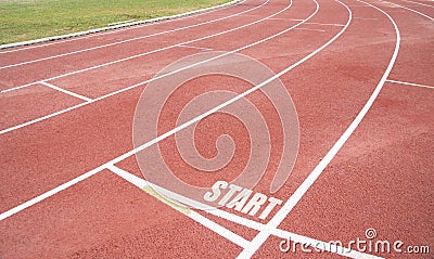 Running track with success or motivation word on vintage style. Stock Photo