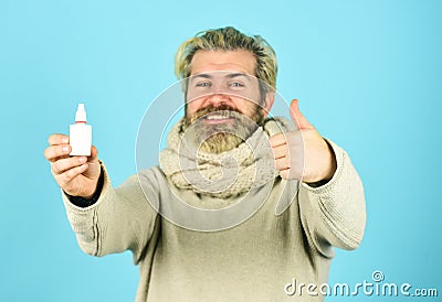 Runny nose recovery. Health care concept. Fast recovery. Cold flu remedies. Runny nose and symptoms of cold. Man scarf Stock Photo