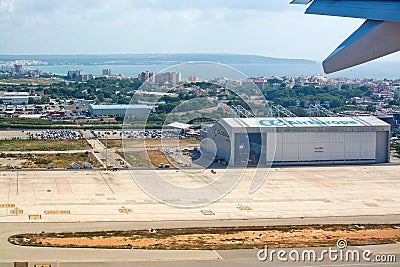 Runway liftoff with Air Europa hangar and view to Playa de Palma Editorial Stock Photo