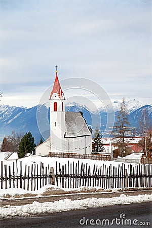 The rural church in alpine village Stock Photo