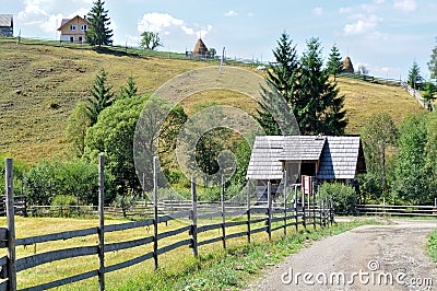 Rural country road fence landscape, Dirt road and wooden fence in a village Stock Photo