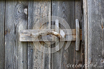 Rural door latch on a wooden door Stock Photo
