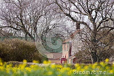 Rural England country scene with trees pub and red telephone box Stock Photo