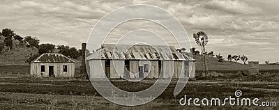 Rural farmlands windmill and outbuildings Stock Photo