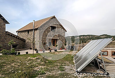 Rural house with solar panel Stock Photo