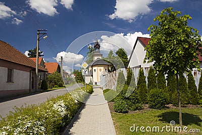 Rural houses and large barns in the fields Stock Photo