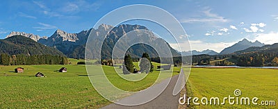 Rural landscape near mittenwald, farmland with huts Stock Photo