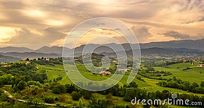 Rural landscape at sunset. Italy mountains, hills and vineyards. panorama. Amazing sky Stock Photo