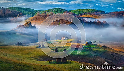 Rural mountain landscape in autumn morning - Fundatura Ponorului, Romania Stock Photo