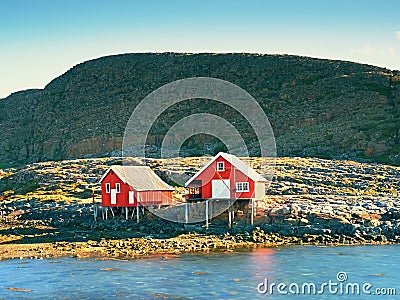 Rural Norwegian landscape, traditional red and white wooden house Stock Photo