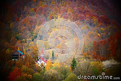 Rural orthodox Church surrounded by forest on a small romanian village Editorial Stock Photo