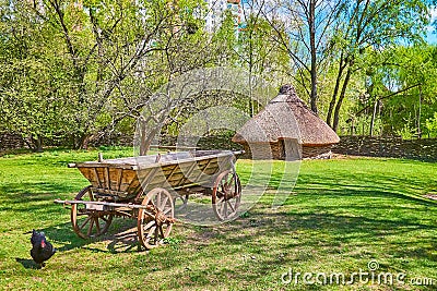 The rural scene with a cart and playpen, Mamajeva Sloboda Cossack Village, Kyiv, Ukraine Stock Photo