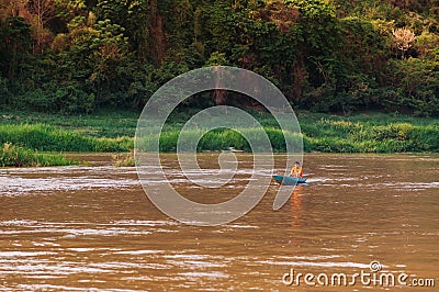 Rural scene Mae khong river local fisherman boat in Luang Prabang - Laos Editorial Stock Photo