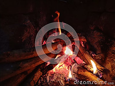 Rural stove cooking with huge flames Stock Photo