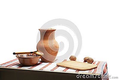 Rural table with clay ceramic dishes and cloth with traditional ukrainian patterns Stock Photo