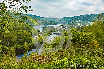 Rursee at Eifel National Park, Germany. Scenic view of lake Rursee and village Einruhr in North Rhine-Westphalia Stock Photo