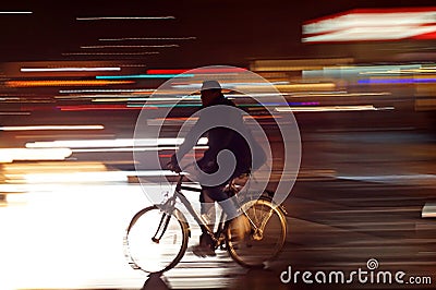 Rushhour with cyclists at night Stock Photo