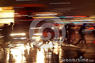 Rushhour with cyclists at night Stock Photo