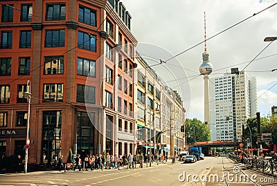 Rushing people on the street with famous structure of Television Tower Editorial Stock Photo