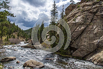 Rushing stream river water through Eleven Mile Canyon Colorado Stock Photo