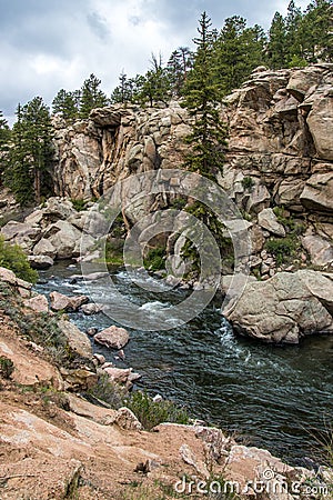 Rushing stream river water through Eleven Mile Canyon Colorado Stock Photo