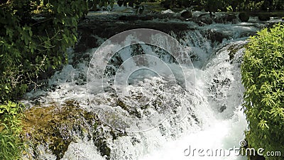 Rushing water flowing from the mountains. Stock Photo