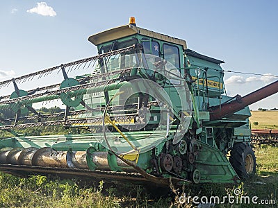 26.07.2020 Russia, Bryansk region. Green Agricultural Harvester. Agricultural machinery for harvesting. Concept of agriculture Editorial Stock Photo