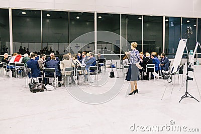 Russia, city Moscow - December 18, 2017: A group of people in the room. Business Training. Team workout meeting concept Editorial Stock Photo