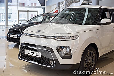 Russia Izhevsk - December 28 2020: KIA showroom. New Ceed SW and Soul in dealer showroom. Front and side view Editorial Stock Photo