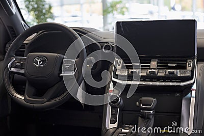 Russia, Izhevsk - September 30, 2021: Toyota showroom. Interior of new modern Land Cruiser 300 in dealer showroom Editorial Stock Photo