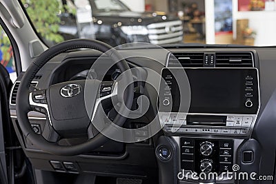 Russia, Izhevsk - September 30, 2021: Toyota showroom. Interior of new modern Land Cruiser Prado car in dealer showroom Editorial Stock Photo