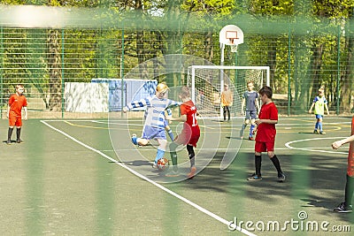 Russia Kaliningrad 2019 teenagers playing football on the covered area Editorial Stock Photo