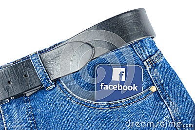 Russia Kaluga 03.07.2020 In the pocket of your trousers there is a phone with the logo of the Facebook social network Editorial Stock Photo