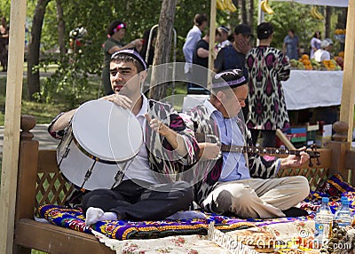 Men play national musical instruments Editorial Stock Photo