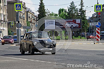 Russia, Magnitogorsk, - June, 20, 2019. Retro car Volvo Amazon 122S rides through the streets of the city on the background of Editorial Stock Photo