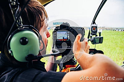 Russia - may, 2019 extreme photographer in a helicopter Editorial Stock Photo