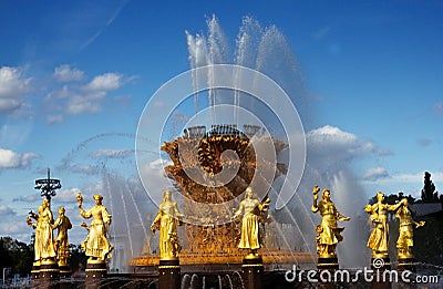 Russia, Moscow, August 2019: the fountain of friendship of the peoples of the USSR against the blue sky on a Sunny day in VDNH Editorial Stock Photo