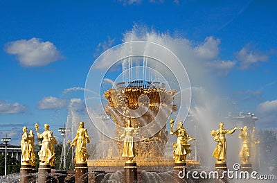 Russia, Moscow, August 2019: the fountain of friendship of the peoples of the USSR against the blue sky on a Sunny day in VDNH Editorial Stock Photo