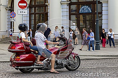 Russia, Moscow, August 4, 2018, a young couple riding a motorcycle, editorial Editorial Stock Photo