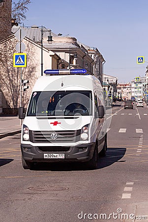 Russia, Moscow: the car of the Ambulance coming down the street Editorial Stock Photo