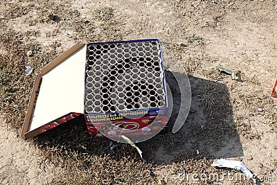 Russia Moscow region September 13, 2019: Left firework batteries spoil the cobblestone pavement after the traditional new years Editorial Stock Photo