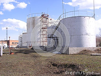 Large storage tanks for industrial fuel at the factory for aviation kerosene reserves in tanks Editorial Stock Photo