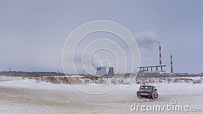 Russia, Novosibirsk - November 30, 2019. Russian low dark car `VAZ Zhiguli` goes quickly turning the wheel sideways in the drift i Editorial Stock Photo