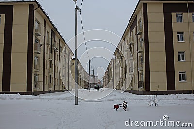 passage for pedestrians sidewalk in winter between houses alley in the city for walking Editorial Stock Photo