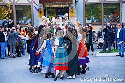 Russia 10-04-2019. Open event in the Russian-German house. Dancing in national costumes in open air Editorial Stock Photo