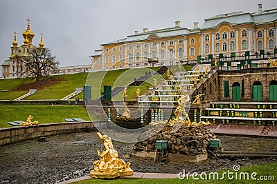 Russia, Peterhof - November 3, 2023: Golden statues on the fountains of the Lower Park in autumn Editorial Stock Photo